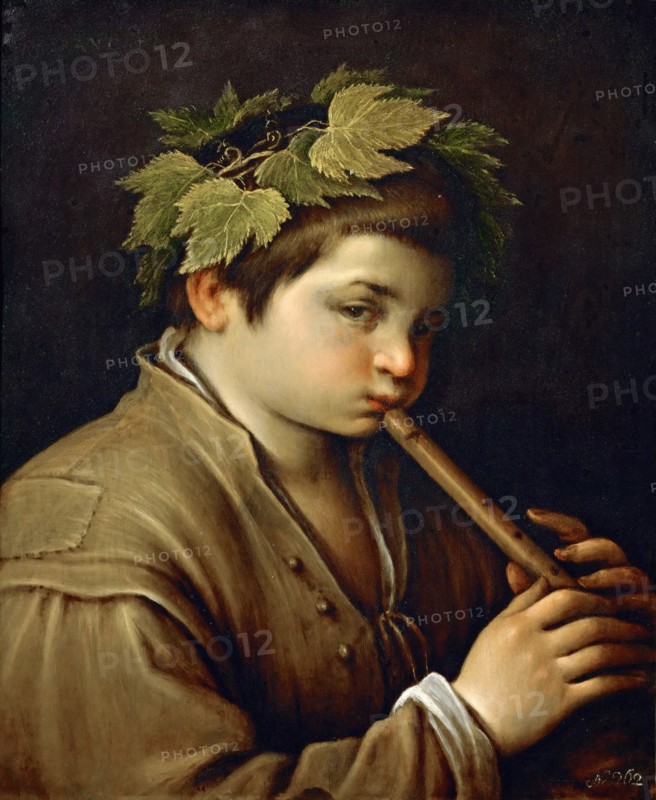 Boy playing the Flute.