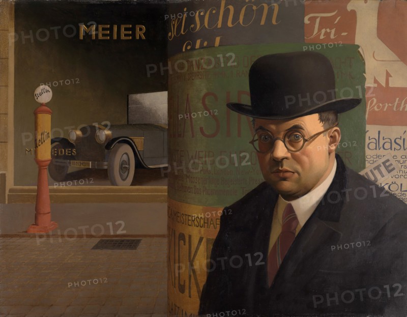 Self-Portrait in Front of an Advertising Column, 1926.