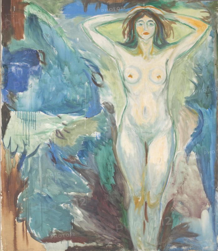 Standing nude against blue background, 1925-1930.