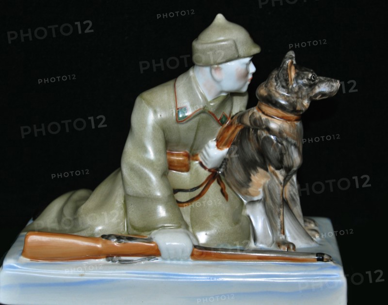 Soviet border guard with his dog, End 1930s.