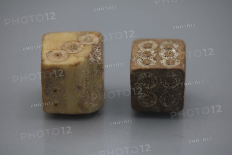 A pair of Roman dice made from carved bone, 1st century BC.