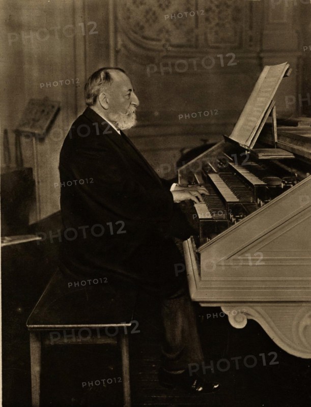 Camille Saint-Saëns (1835-1921) at the Organ, 1913. Creator: Anonymous.