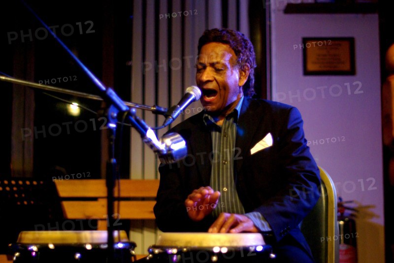 Frank Holder, Guyanan jazz singer and percussionist, Jazz Hastings, Hastings, East Sussex.  Artist: Brian O'Connor
