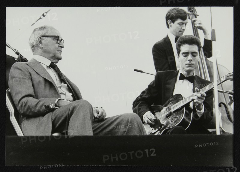 Benny Goodman watching Phil Flanigan and Chris Flory, Knebworth, Hertfordshire, 1982. Artist: Denis Williams