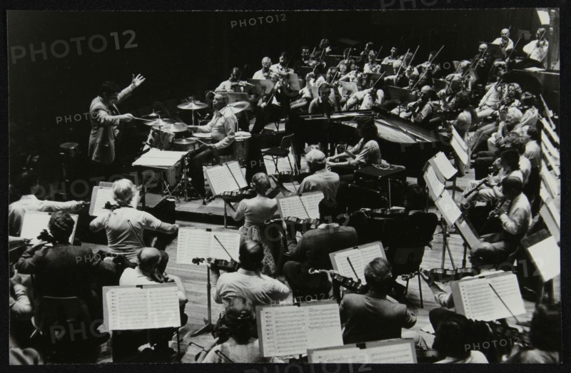 Buddy Rich and the Royal Philharmonic Orchestra in concert at the Royal Festival Hall, London, 1985. Artist: Denis Williams