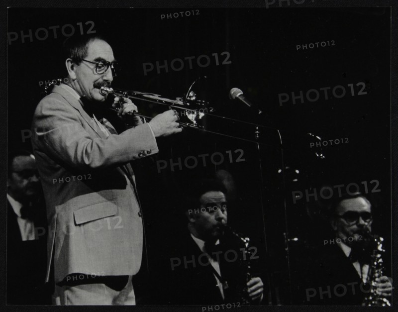 Trombonist Don Lusher playing with the Ted Heath Orchestra. Artist: Denis Williams