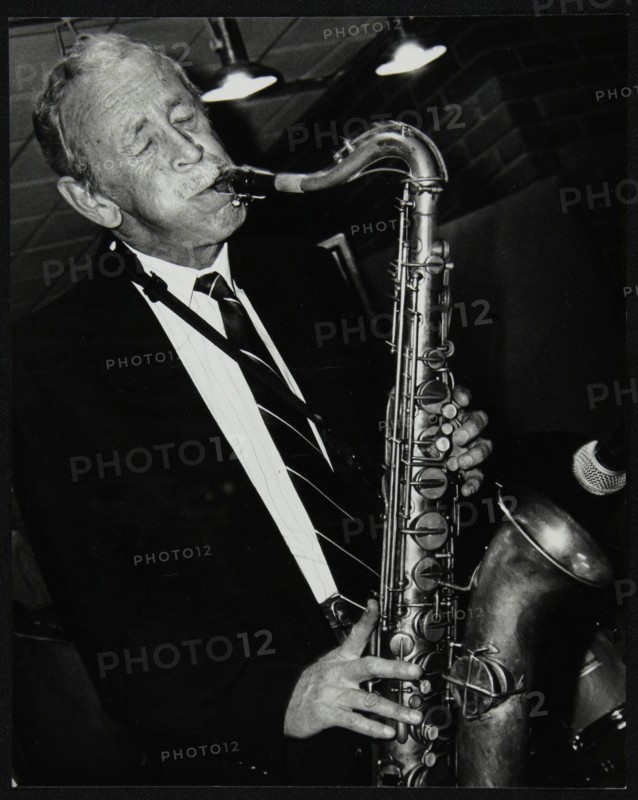 Tenor saxophonist Spike Robinson playing at The Fairway, Welwyn Garden City, Hertfordshire, 1992. Artist: Denis Williams