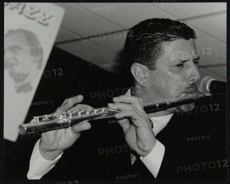 Benn Clatworthy playing the flute at The Fairway, Welwyn Garden City, Hertfordshire, 2002. Artist: Denis Williams
