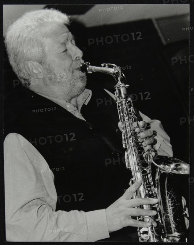 Geoff Simkins playing alto saxophone at The Fairway, Welwyn Garden City, Hertfordshire, 2002. Artist: Denis Williams