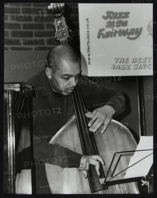 Double bassist Gary Crosby playing at The Fairway, Welwyn Garden City, Hertfordshire, 2004. Artist: Denis Williams