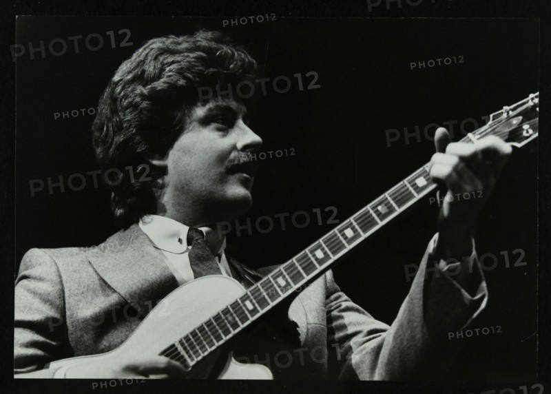 Guitarist Martin Taylor playing at the Forum Theatre, Hatfield, Hertfordshire, 1983. Artist: Denis Williams