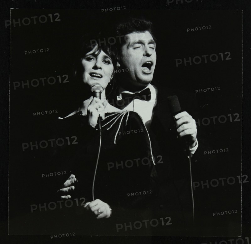 Georgie Fame and Sweet Substitute with Keith Smith's Hefty Jazz in concert, 1984. Artist: Denis Williams