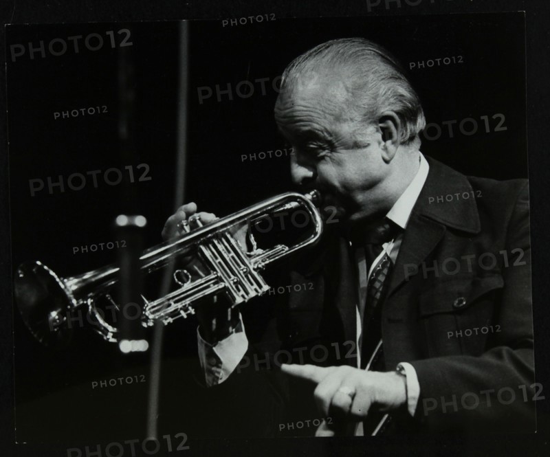 Trumpeter Kenny Baker playing at the Forum Theatre, Hatfield, Hertfordshire, 1978. Artist: Denis Williams