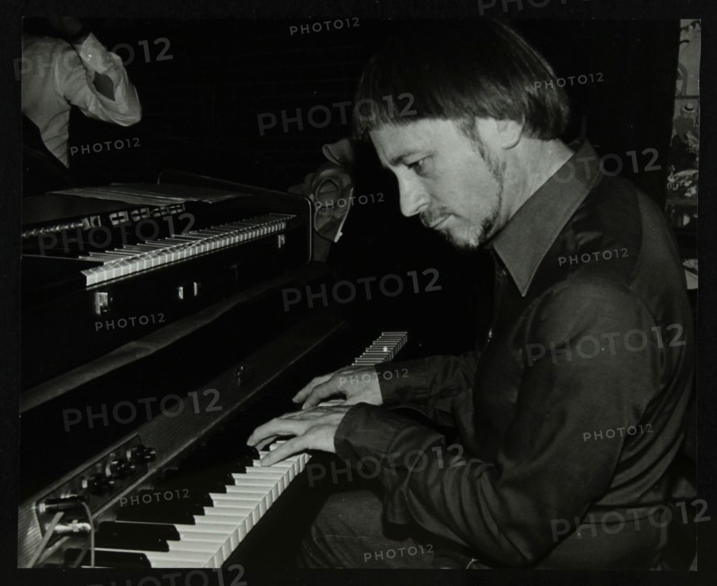 Michael Garrick playing the piano at The Bell, Codicote, Hertfordshire, 28 October 1980. Artist: Denis Williams