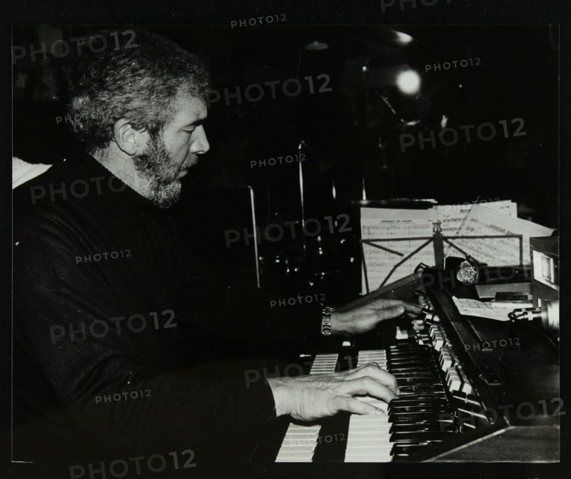 Ron Lohn playing the electronic organ at The Bell, Codicote, Hertfordshire, 22 February 1981. Artist: Denis Williams