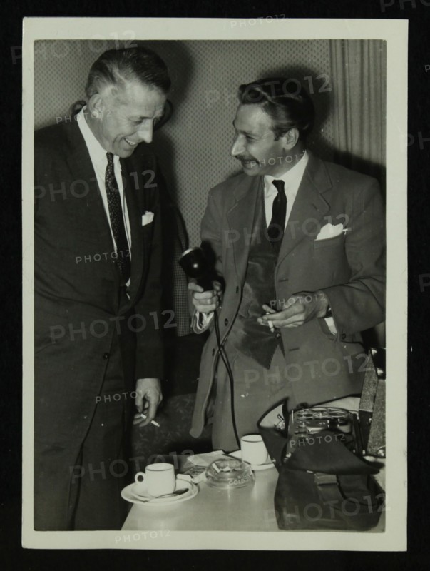 American bandleader Stan Kenton giving an interview, c1950s. Artist: Denis Williams