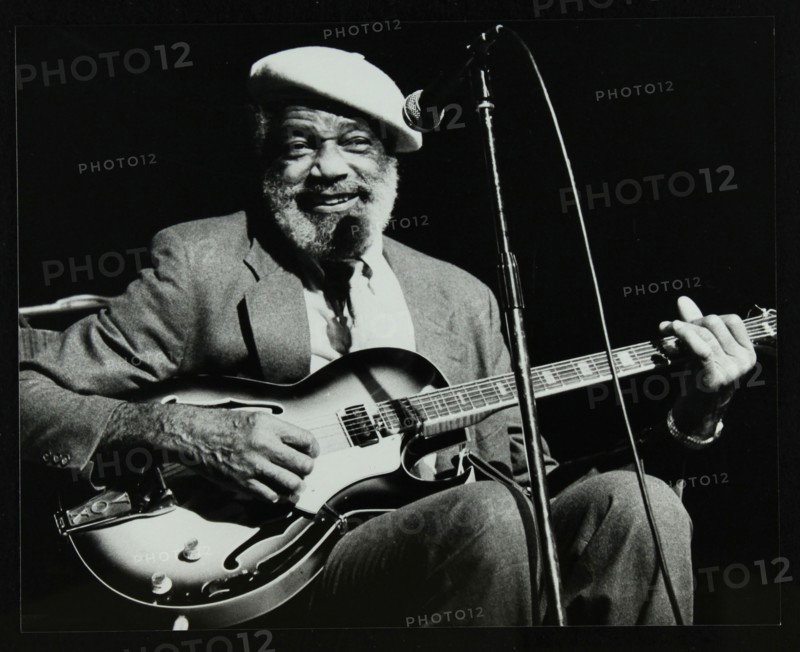 Slim Gaillard playing his guitar at the Forum Theatre, Hatfield, Hertfordshire, 13 November 1986. Artist: Denis Williams