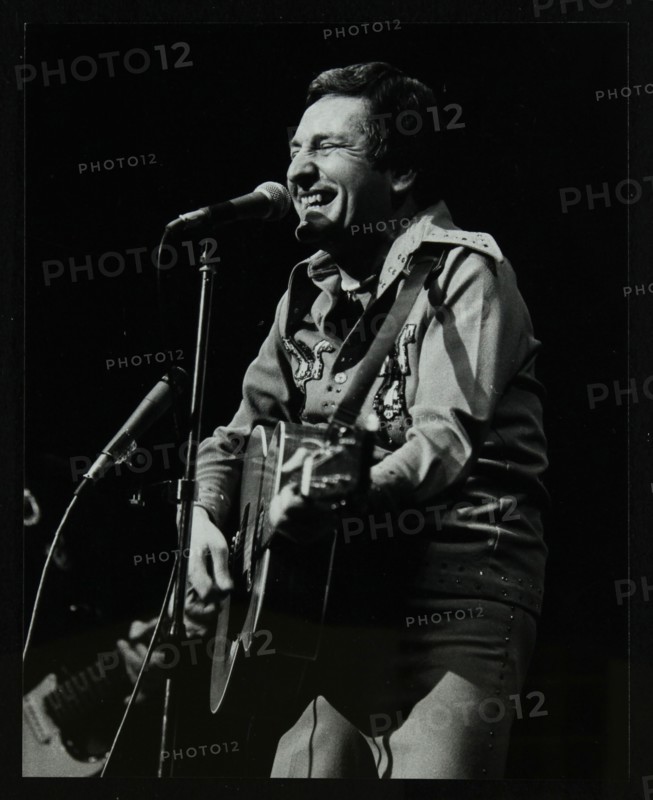 Lonnie Donegan on stage at the Forum Theatre, Hatfield, Hertfordshire, April 1979. Artist: Denis Williams