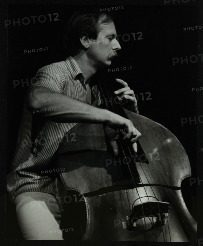 Bassist Paul Bridge playing at The Stables, Wavendon, Buckinghamshire. Artist: Denis Williams