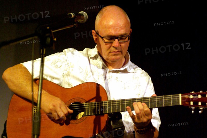 Kevin Armstrong, guitarist, producer, songwriter, and composer, Brecon, 2009. Artist: Brian O'Connor.
