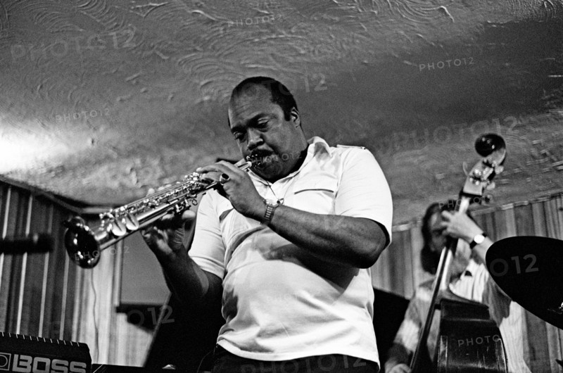 Nathan Davis and Peter Ind, Bass Clef, Hoxton Square, London, August 1987. Artist: Brian O'Connor.
