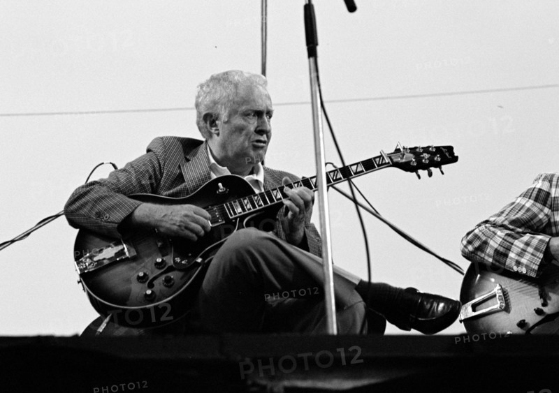 Herb Ellis, Knebworth Jazz Festival, Herts, July 1982. Artist: Brian O'Connor.