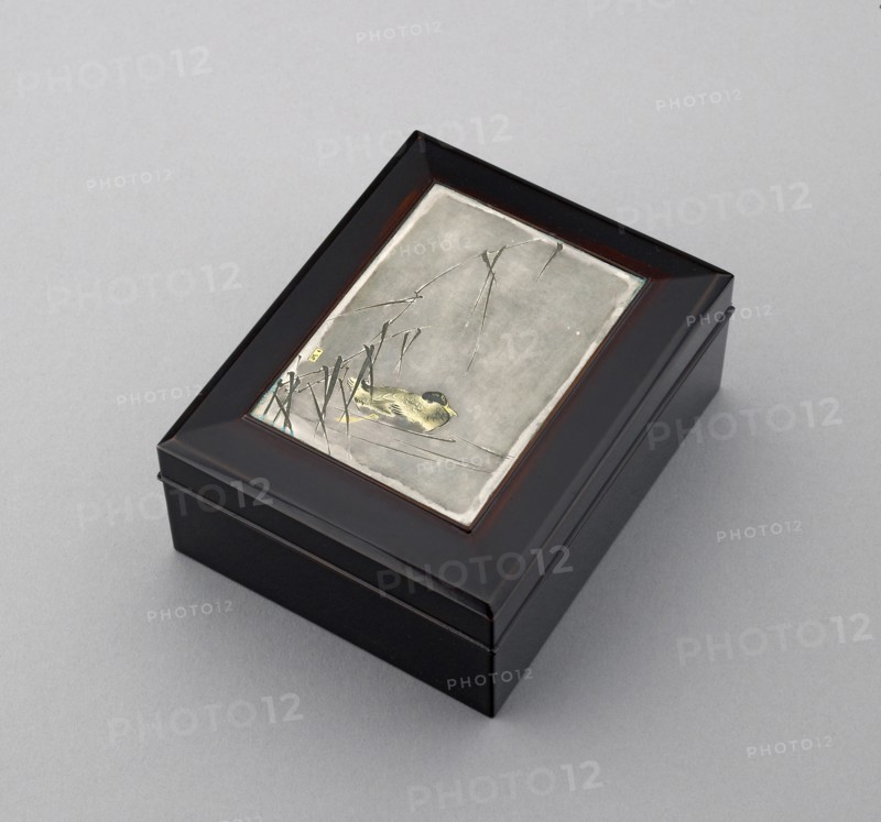 Box with plaque depicting a duck swimming past reeds, probably before 1908. Artist: Ikkoku Kajima.