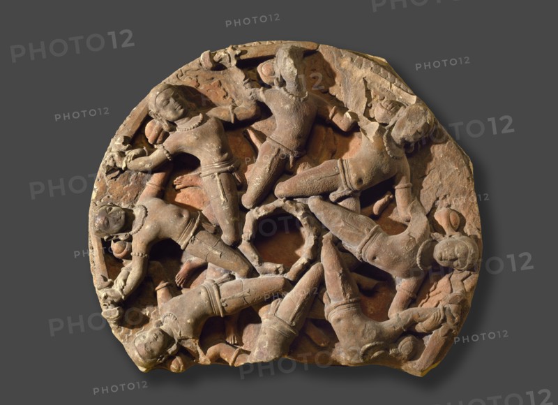 Boss from a temple ceiling with circle of flying warriors, late 8th century-early 9th century Artist: Unknown.
