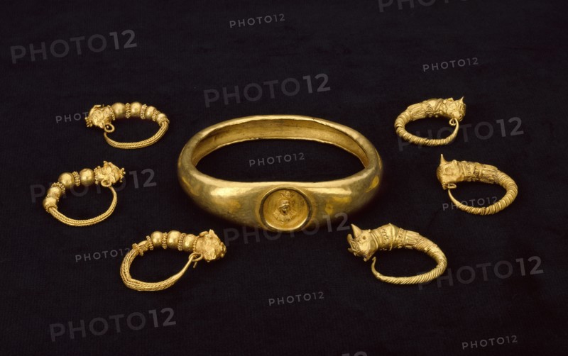 Gold earrings and gold armlet, fom a temple treasure, 4th-3rd century BC. Artist: Unknown.