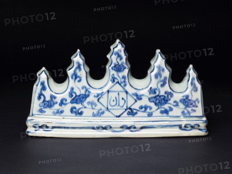 Brush rest with floral scroll and Arabic calligraphy, Ming Dynasty, Zhengde Period, 1506-1521. Artist: Unknown.