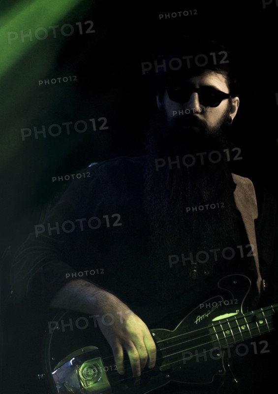 Valerie June's bass player, 2017. Artist: Alan John Ainsworth.