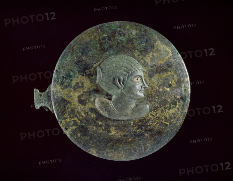 Cast bronze mirror-cover with bust of a woman in relief, 1st century BC - 1st century AD. Artist: Unknown.