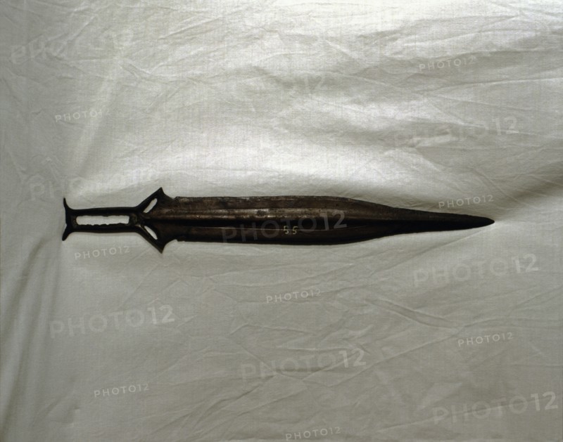 Sword of three parts barb, carp's tongue shaped blade, from Palma del Rio (Cordoba).
