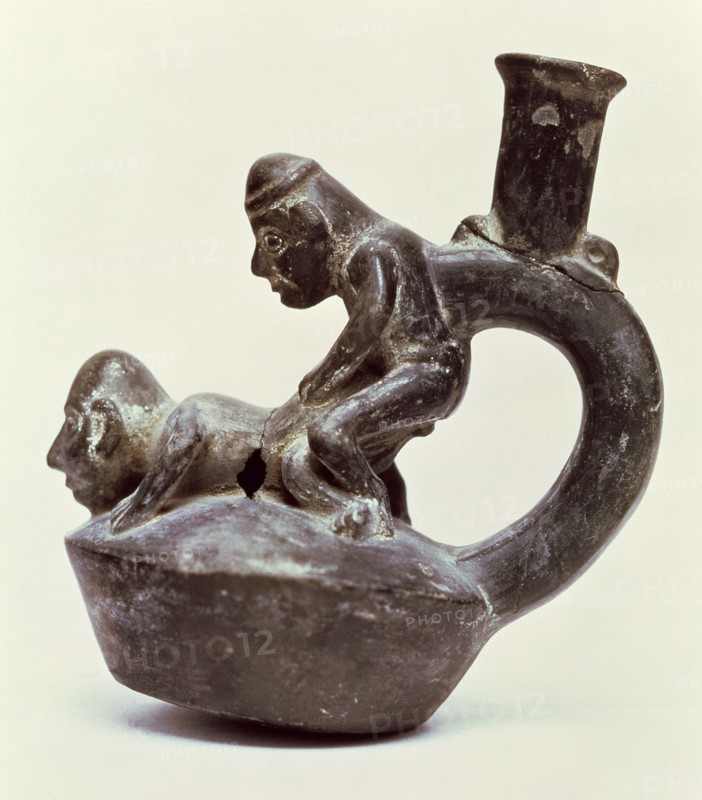 Anthropomorphic Vase with stirrup handle depicting two male persons performing a sex act, belongi?
