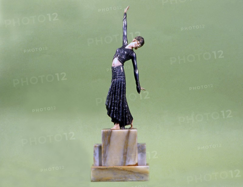 Dancer, mounted on ivory, metal and marble base.