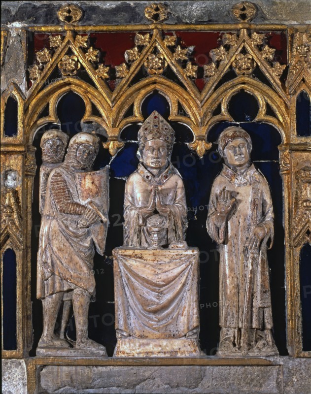 'Tomb of Saint Narcissus'. Front detail with Saint Narcissus saying Mass between warriors and an?