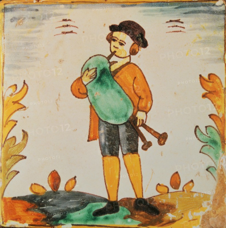 Tiles of the Palmita series. Musician playing the bagpipe (rustic).