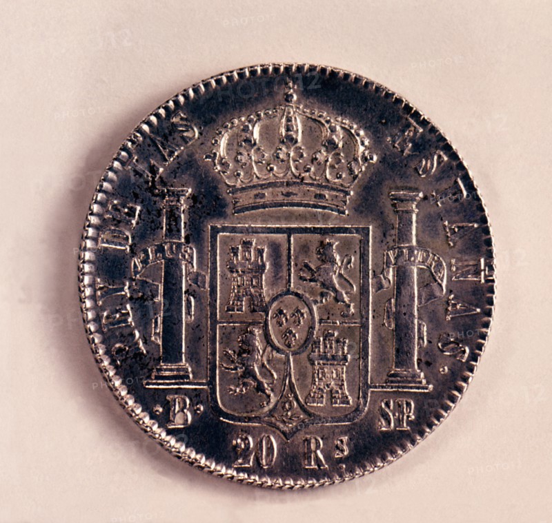 Back of a coin of 20-reales in silver, Ferdinand VII. Mint: Barcelona, 1823.