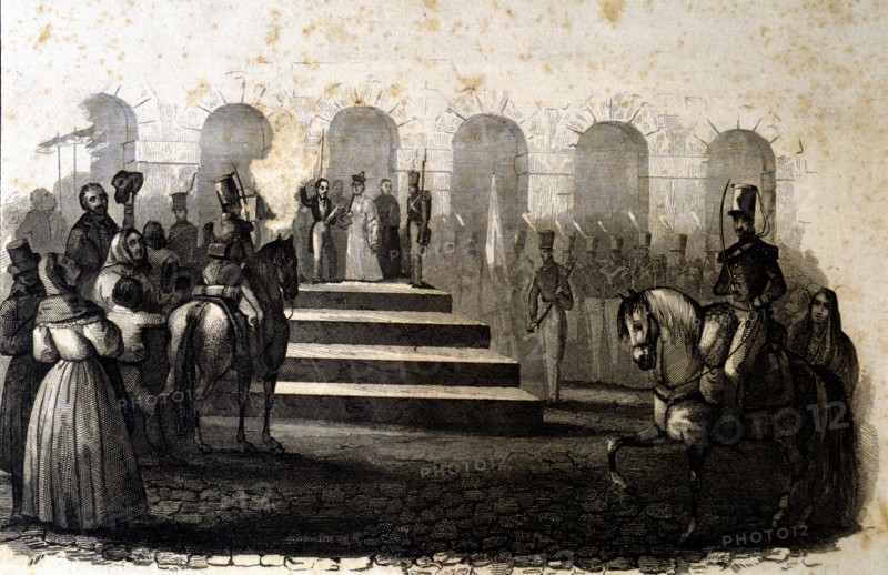 Public reading of the proclamation of Elizabeth II as Queen of Spain under the regency of her mot?