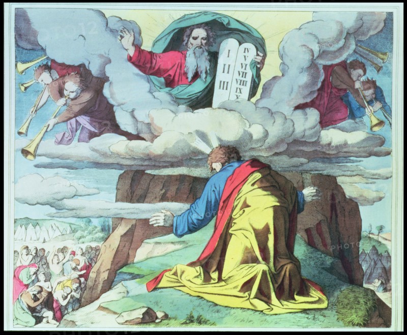 God gives Moses the Ten Commandments on Mount Sinai, engraving, 1860.