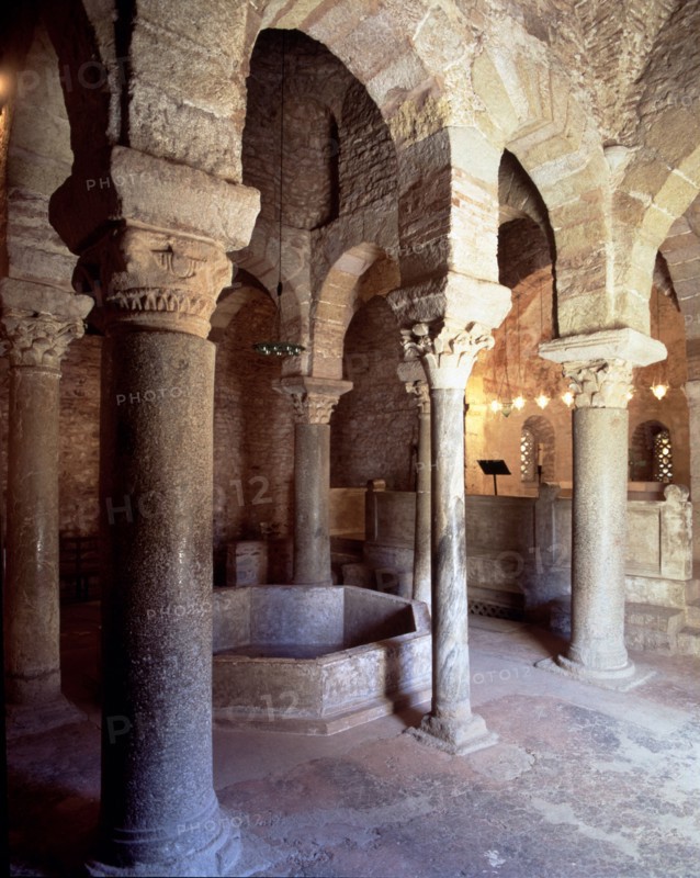 Baptistery of San Miguel de Egara in Terrassa, interior view with columns arranged around the font.