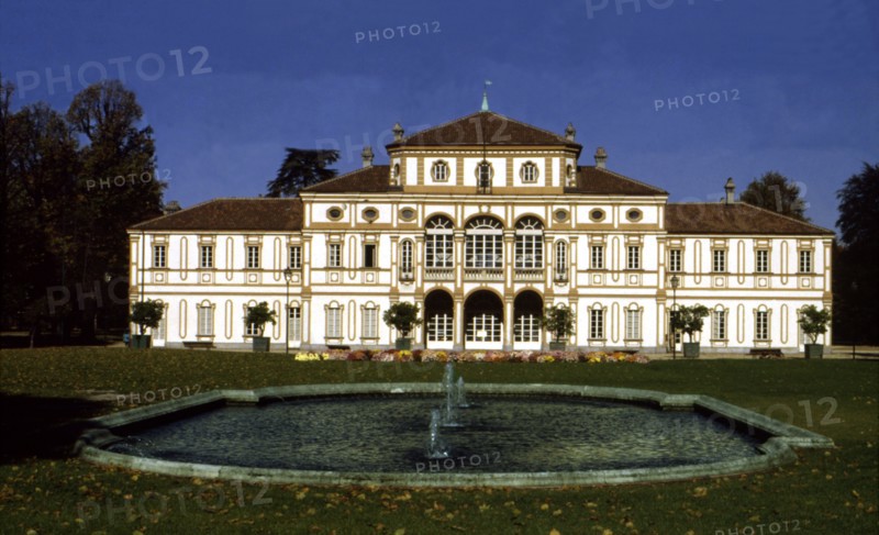 View of the exterior of the building and gardens of the Treasury Villa.