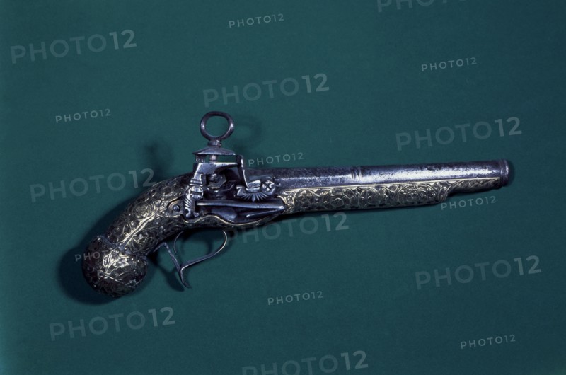Flintlock pistol with miguelete key.
