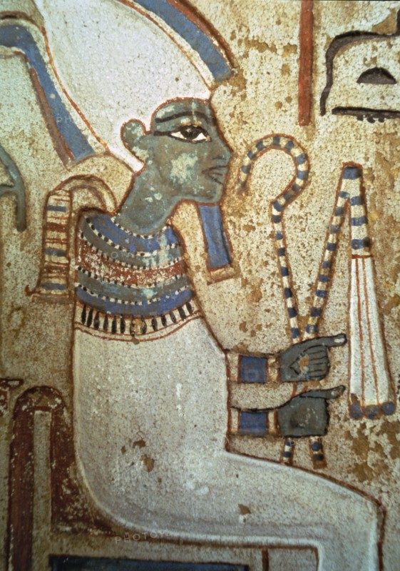 Funerary stela representing god Osiris, made in polychromed limestone. From Thebes.