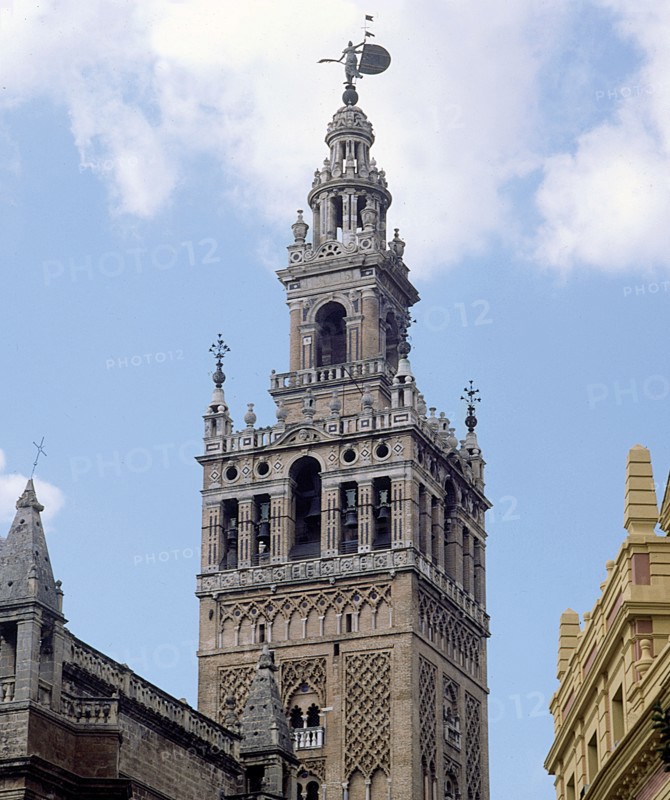 Giralda Tower in Seville, two-thirds are from 12th century in Almohad style and the top was finis?