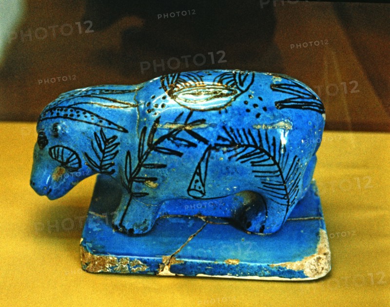 Hippo, blue glazed ceramic figurine, side view.