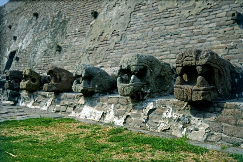 Tenayuca Pyramid, Aztec construction, the below part of the wall has snake heads surrounding the ?