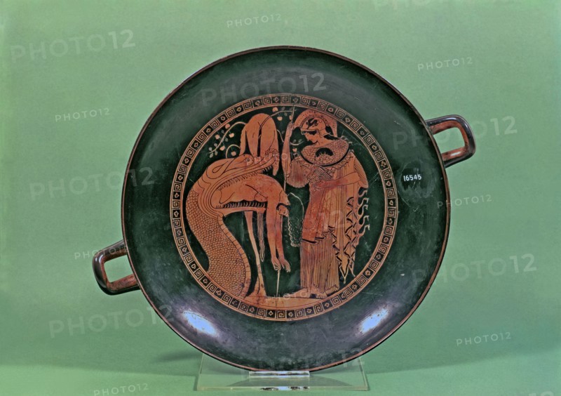 Attic Cup with the representation of Athena and the Dragon of Colchis throwing the body of Jason.
