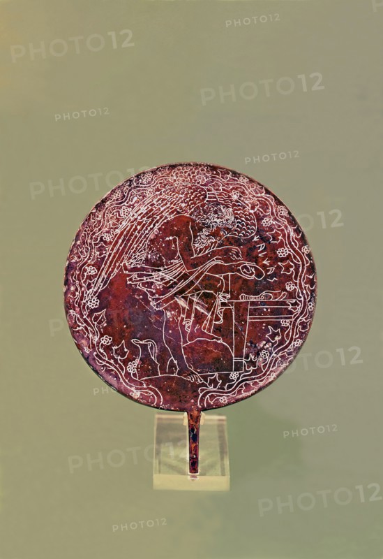 Chalcas Aruspex examining a liver, representation in a bronze mirror.