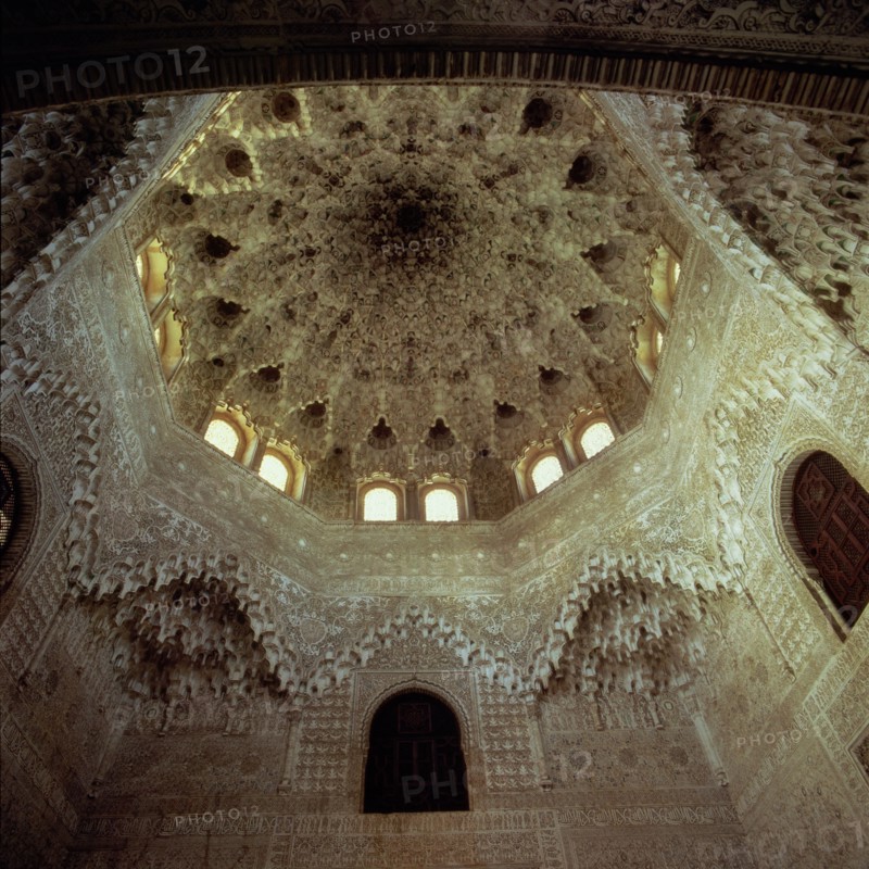View of the mocarabes dome in the Abencerrajes room in the Alhambra of Granada.